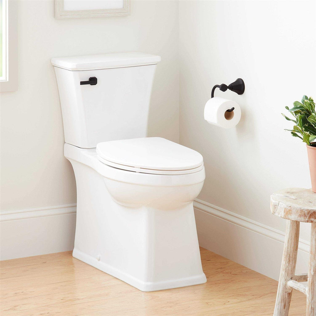 1.28 GPF Two Piece Skirted Elongated Toilet A321687
